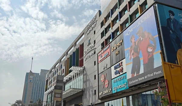 Display board showcasing the variety of top-tier brands available at Orion Uptown Mall near Sobha Hoskote