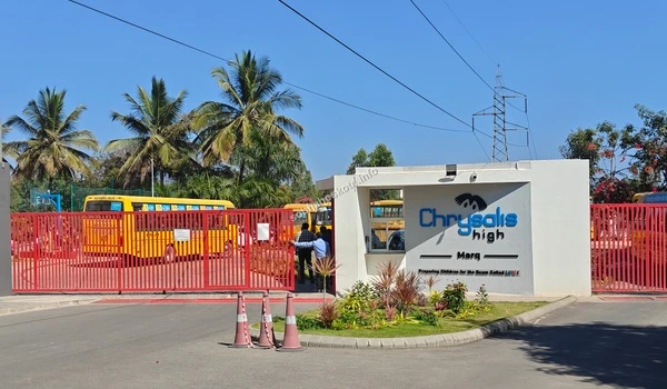 A perspective of the school frontage and decorative landscaping at Chrysalis High, situated conveniently for families living at Sobha Hoskote