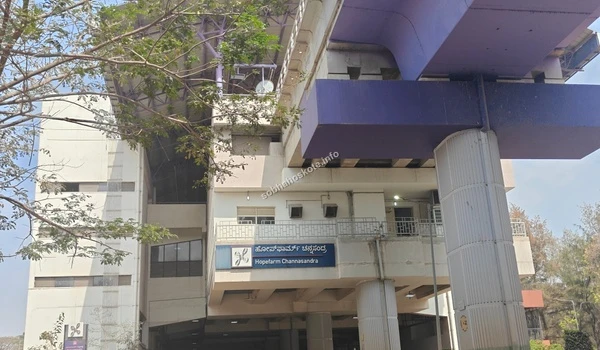 A close-up of the Hopefarm Channasandra Metro Station, highlighting the convenient public transport options for Sobha Hoskote residents.