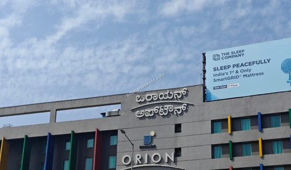 Exterior view of Orion Uptown Mall featuring premium retail brands near Sobha Hoskote