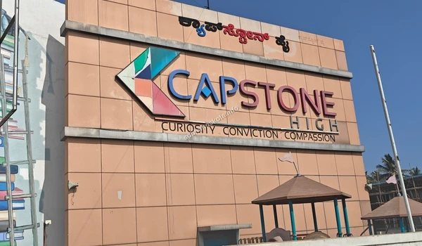 Peaceful surroundings and exterior facade of Capstone High School close to the Sobha Hoskote project