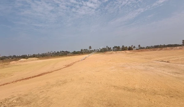 Wide-angle landscape of the Sobha Hoskote development area highlighting the vast cleared terrain ready for infrastructure