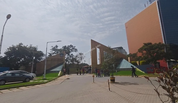 Distant perspective of the main entrance driveway leading into the business hub located close to Sobha Hoskote