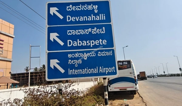 The open landscape along the STRR towards Devanahalli, showing the wide lanes and modern street lighting serving the Sobha Hoskote vicinity
