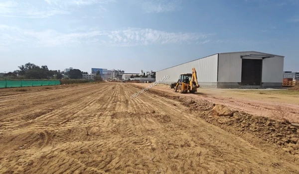 Daytime field operations and site logistics management at the Sobha Hoskote residential site