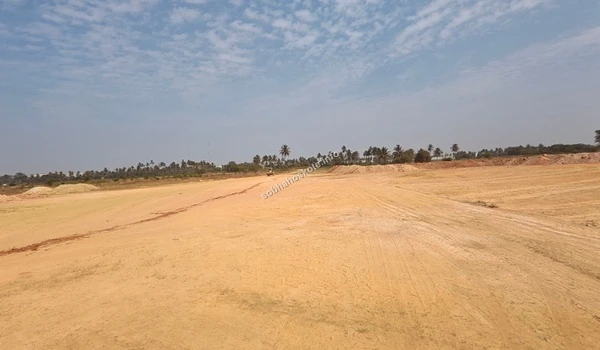 Aerial perspective of the land contouring and foundational site preparation work at Sobha Hoskote