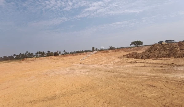 Panoramic shot of the construction area at Sobha Hoskote highlighting the extensive land grading and soil mounds ready for foundation work
