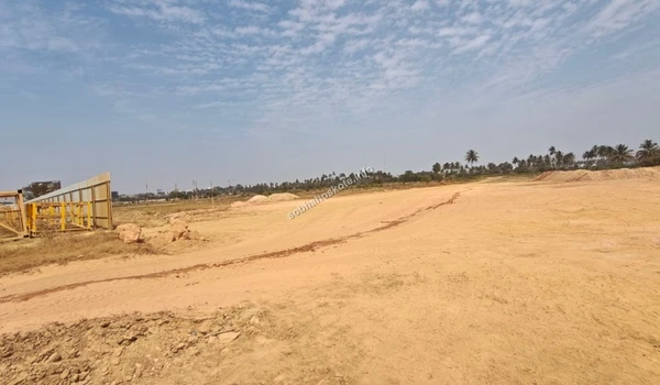 Wide view of the land preparation and soil leveling activities currently underway at the Sobha Hoskote site