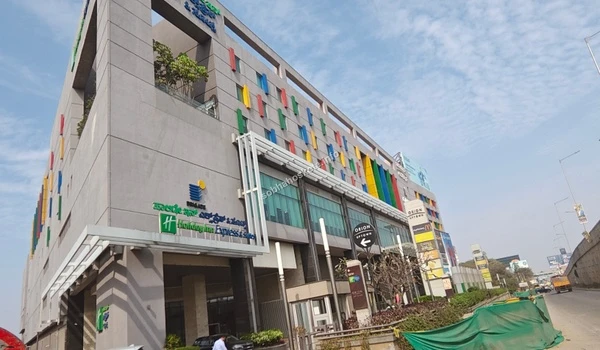 The main pedestrian entrance of the shopping mall designed for high footfall and easy shopper access near Sobha Hoskote