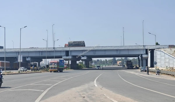 Detailed view of the modern underpass and structural bridge design facilitating multi-directional transit for Sobha Hoskote residents