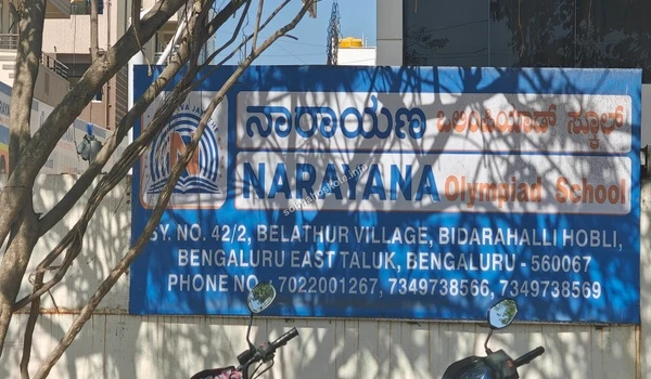 Full view of the Narayana Olympiad School board showing address and phone numbers near Sobha Hoskote