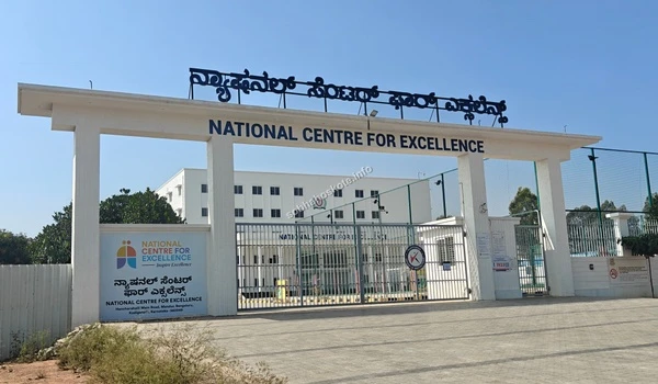 Full view of the National Centre For Excellence entrance gate and boundary wall near Sobha Hoskote