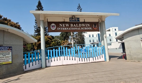 Architectural view of the entrance arch at New Baldwin International School providing premium education near Sobha Hoskote