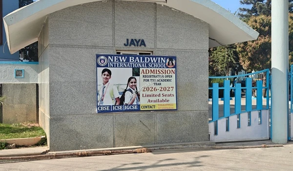 Daylight exterior view of the New Baldwin International School gate providing easy access for families residing in Sobha Hoskote