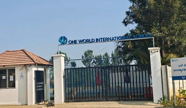 The official campus signage of One World International School providing prime educational convenience for Sobha Hoskote residents
