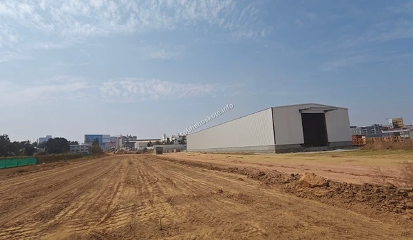 A large onsite material warehouse and storage facility established at the Sobha Hoskote construction site