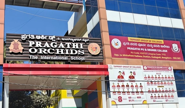 Exterior view showing Pragathi PU & Degree College banner on the school building facade near Sobha Hoskote