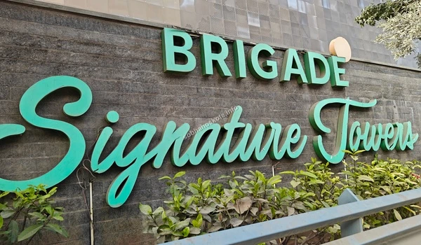 The primary entry gate landmark for the Brigade Signature Towers business district serving the Sobha Hoskote area