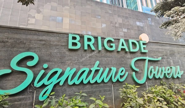 A view of the bustling road network and junction connectivity near Brigade Signature Towers and Sobha Hoskote