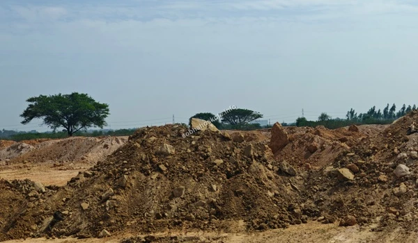 Extensive land clearing and ground leveling activities at the Sobha Hoskote construction site