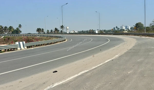 Looking across the Satellite Town Ring Road (STRR) section that provides rapid access to major highways from the Sobha Hoskote residential project