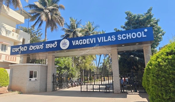 The grand entrance arch of Vagdevi Vilas School showcasing the lush green campus environment near Sobha Hoskote