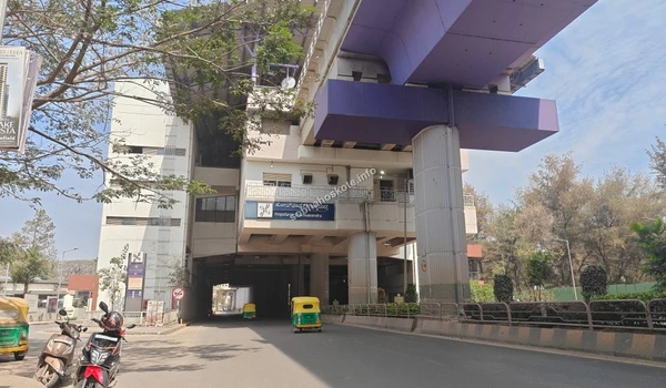 Street view of the modern metro infrastructure at Hopefarm Channasandra, providing easy transit for Sobha Hoskote homeowners.